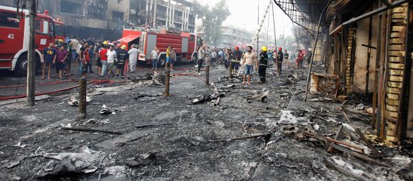 Пожарные машины на месте взрыва в Багдаде - Sputnik Молдова