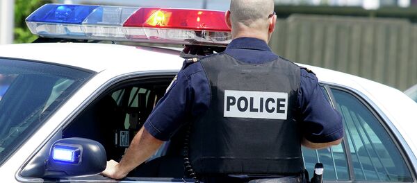 Офицер полиции США - Sputnik Молдова