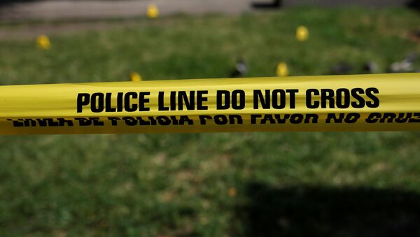 Police tape is seen at Rosa Parks Plaza near the shooting scene in Dallas, Texas, U.S., July 8, 2016. - Sputnik Moldova-România