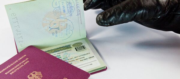 Gloved thief trying to steal a passport Gloved thief trying to steal a passport - Sputnik Moldova-România
