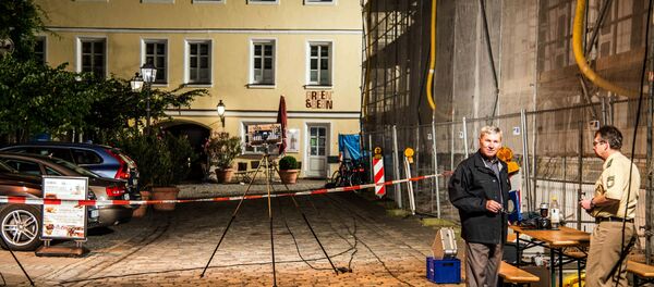 Officers are seen at police cordon near the site of a suicide attack in the southern German city of Ansbach on 25 June, 2016 - Sputnik Молдова