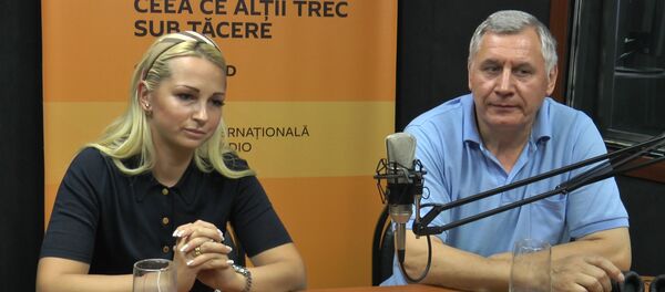 Марина Таубер и  Павел Мидриган - Sputnik Moldova