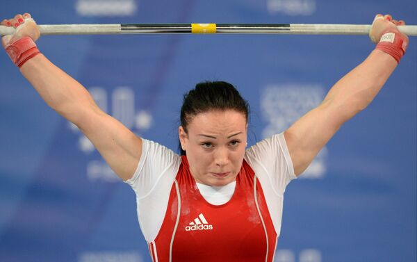 Бронзовая медалистка Олимпиады в Лондоне тяжелоатлетка Кристина Йову - Sputnik Молдова