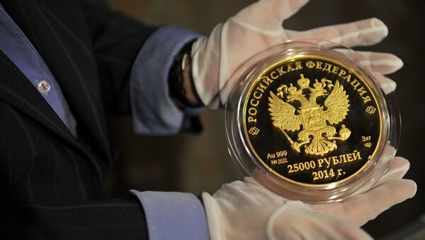Monedă emisă de Banca Centrală a Rusiei, dedicată programului ”Soci 2014” - Sputnik Moldova-România