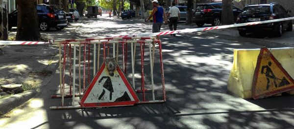 Обвал асфальта на перекрестке улиц Чуфли и 31 Августа 1989 года в Кишиневе - Sputnik Молдова