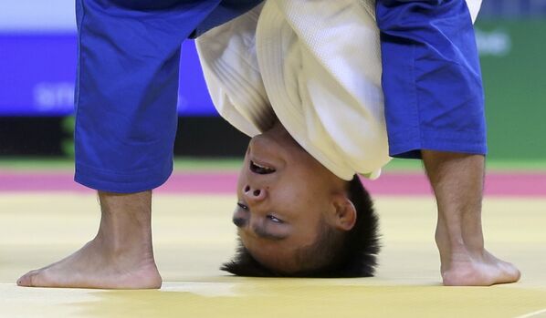 Judocanul Min Yen Tsay din China luptă în runda preliminară cu adversarul său din Laos la cea de-a XXXI-a ediție a JO de vară de la Rio de Janeiro. - Sputnik Moldova