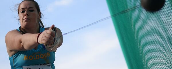 Залина Маргиева в финальных соревнованиях по легкой атлетике в метании молота среди женщин - Sputnik Молдова
