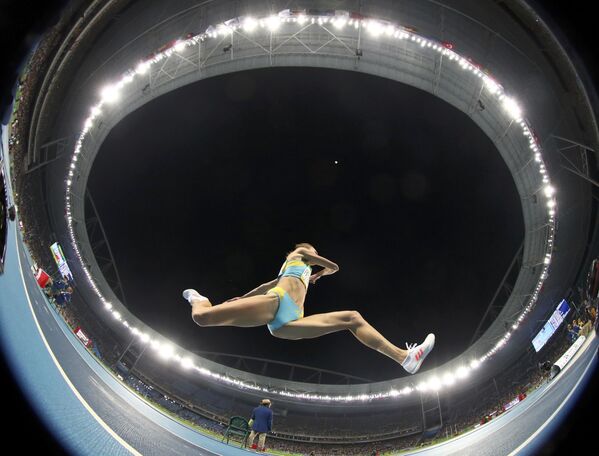 Săritoarea în lungime Olga Pâpakova din Kazahstan în timpul competițiilor de la JO de la Rio. - Sputnik Moldova