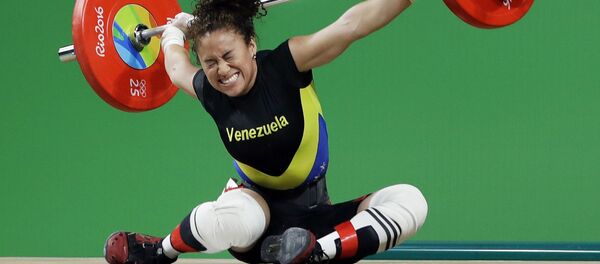 Căderea sportivei din Venezuela, FIGUEROA  Yusleidy,  în timpul competițiilor la JO de la Rio. - Sputnik Moldova