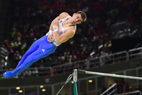 Гимнаст Макс Уитлок из Великобритании во время соревнований на Олимпийских играх-2016 в Рио-де-Жанейро - Sputnik Молдова