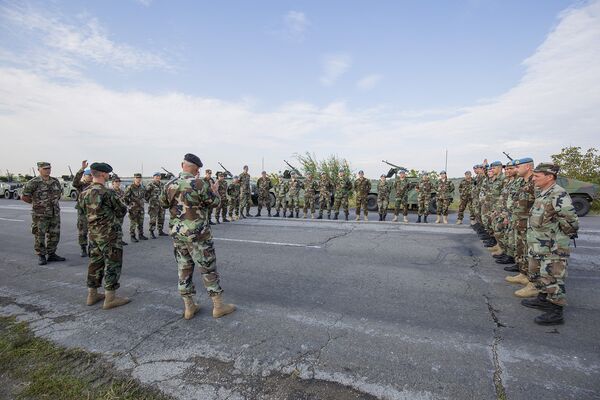Repetiție pentru parada militară. Militari moldoveni Repetiție pentru parada militară. Militari moldoveni - Sputnik Moldova