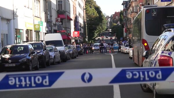 Женщина с ножом напала на пассажиров автобуса в Брюсселе. Кадры с места ЧП - Sputnik Молдова