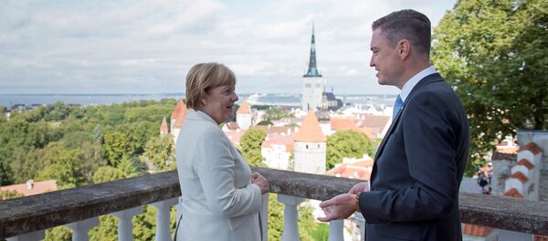 Ангела Меркель и Таави Рыйвас. Ангела Меркель и Таави Рыйвас. - Sputnik Молдова