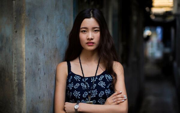 Portret feminin realizat în Beijing, China, de fotografa româncă Mihaela Noroc. Fotografia a fost inclusă în proiectul fotografic ”The Atlas of Beauty”. - Sputnik Moldova-România