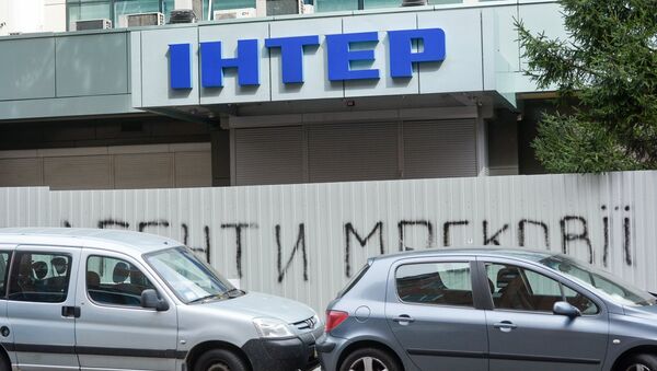 Последствия пожара в здании телеканала Интер в Киеве - Sputnik Moldova