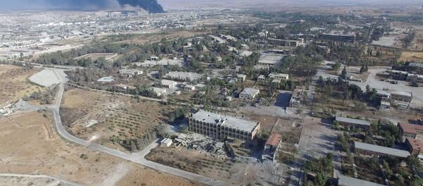 В районе училища тыла на юго-западе Алеппо в Сирии - Sputnik Молдова