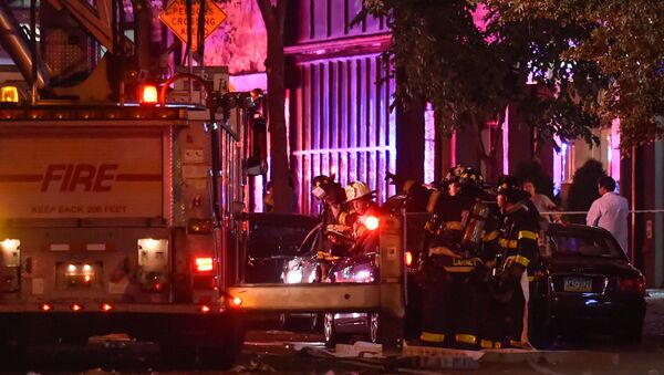 New York City firefighters stand near the site of an explosion in the Chelsea neighborhood of Manhattan, New York September 17, 2016. - Sputnik Moldova