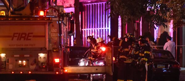 New York City firefighters stand near the site of an explosion in the Chelsea neighborhood of Manhattan, New York September 17, 2016. New York City firefighters stand near the site of an explosion in the Chelsea neighborhood of Manhattan, New York September 17, 2016. - Sputnik Moldova