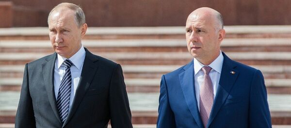 Президент России Владимир Путин и премьер-министр Молдовы Павел Филип Президент России Владимир Путин и премьер-министр Молдовы Павел Филип - Sputnik Молдова