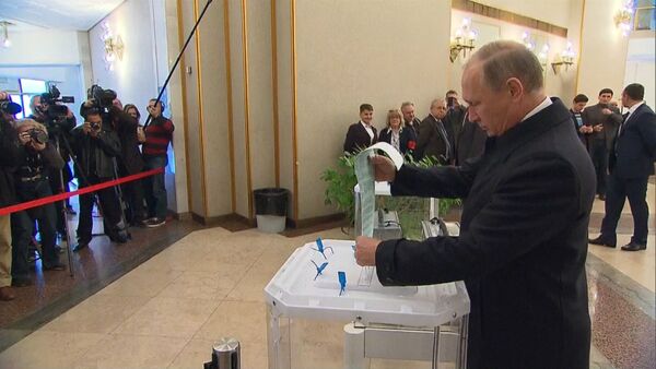 Путин проголосовал на выборах депутатов Государственной думы РФ - Sputnik Moldova