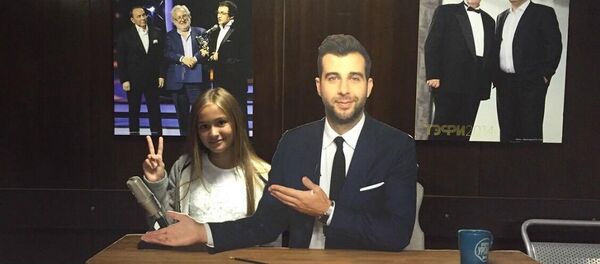 Одиннадцатилетняя Юлиана Берегой из Оргеева прошла кастинг на шоу Голос. Дети - Sputnik Молдова