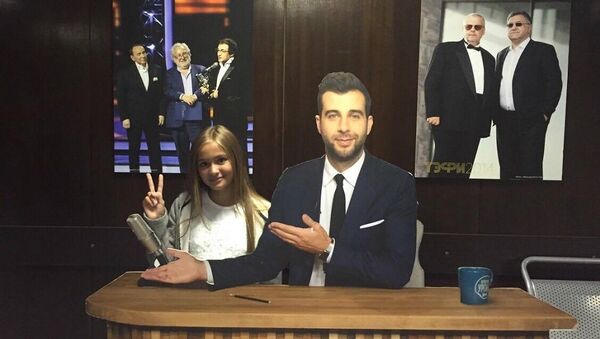 Одиннадцатилетняя Юлиана Берегой из Оргеева прошла кастинг на шоу Голос. Дети - Sputnik Молдова