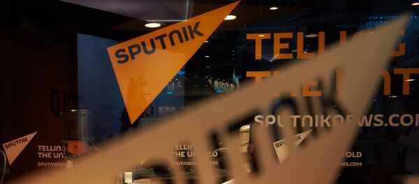 Pavilion of the Sputnik international information brand at the Lenexpo Exhibition Center ahead of the 2015 St. Petersburg International Economic Forum - Sputnik Молдова