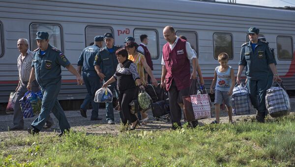 Беженцы из Украины прибыли в Омск - Sputnik Moldova-România