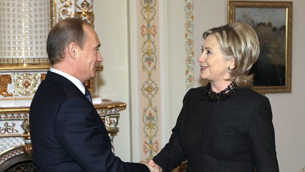 Russian Prime Minister Vladimir Putin meets with US Secretary of State Hillary Clinton in Novo-Ogarevo - Sputnik Moldova-România
