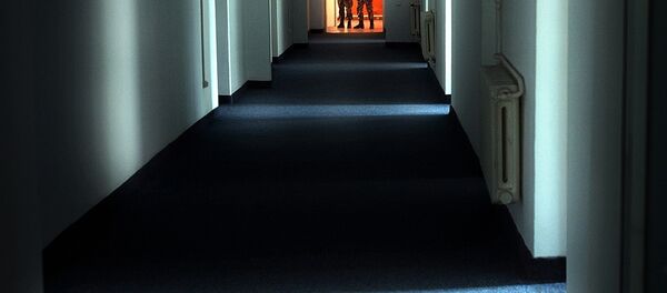 In this Wednesday, Nov. 9, 2005, file picture Romanian military staff stand at the end of a corridor on the Mihail Kogalniceanu airbase, near the Black Sea port of Constanta, a Soviet-era facility which became a key focus of a European investigation into allegations that the CIA operated secret prisons, some 250 kilometers (155 miles) east of Bucharest, Romania. - Sputnik Moldova-România