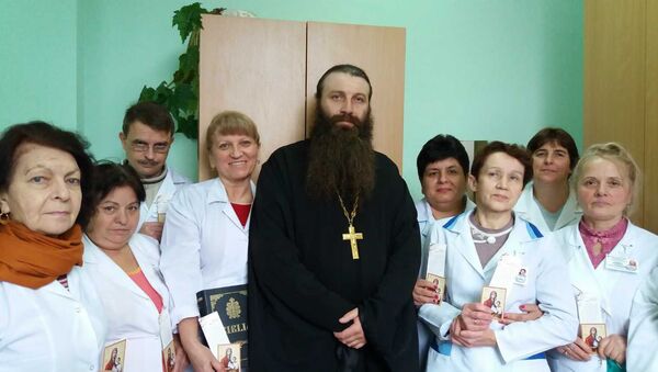 Părintele Marin Cij, Biserica şi spitalul – două spații complementare sănătăţii fiinţei umane” - Sputnik Moldova