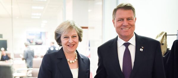 Klaus Iohannis si Theresa May - Sputnik Moldova-România