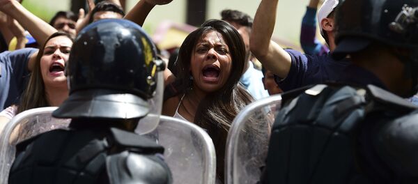 Митинг против президента Николаса Мадуро в венесуэльском городе Лос-Текес Митинг против президента Николаса Мадуро в венесуэльском городе Лос-Текес - Sputnik Moldova-România