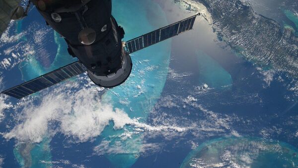Fotografia cu vederea Pământului de pe Stația Spațială Internațională, făcută de cosmonautul rus Serghei Volkov - Sputnik Moldova-România