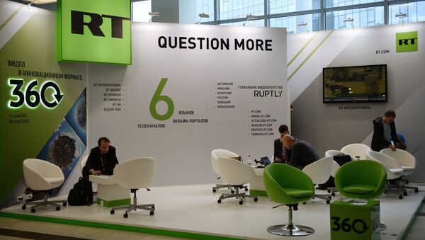 The Russia Today TV channel stand at the Eastern Economic Forum - Sputnik Moldova-România