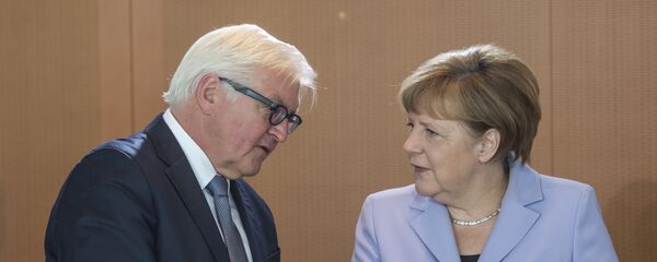 Федеральный канцлер Германии Ангела Меркель и министр иностранных дел Германии Франк-Вальтер Штайнмайер - Sputnik Moldova