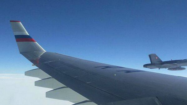 Швейцарские истребители сопроводили летевший на АТЭС борт с делегацией РФ - Sputnik Moldova